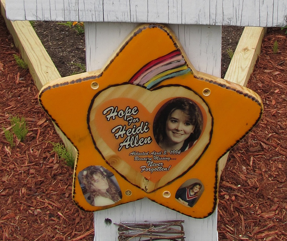 Memorial orange star with images of Heidi