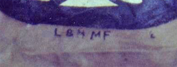 letters LBHMF written inside shirt