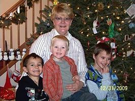 boys at christmas with mom