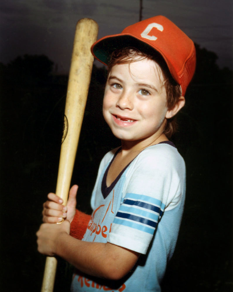 Adam Walsh holding a baseball bat