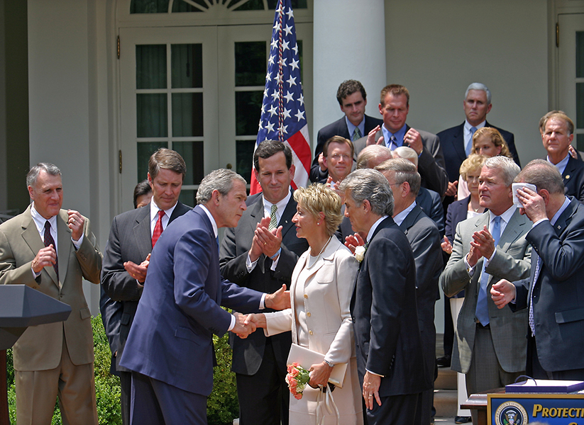 President George Bush with the Walshs in the White House Rose Garden