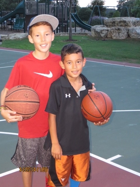 Mena boys on basketball court