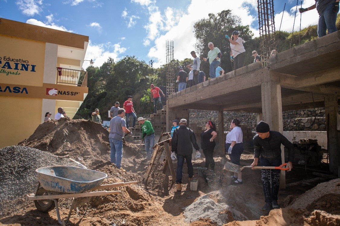 Workers constructing a building