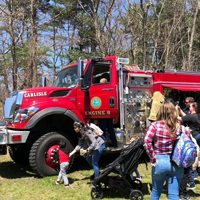 Children amazed by a fire truck