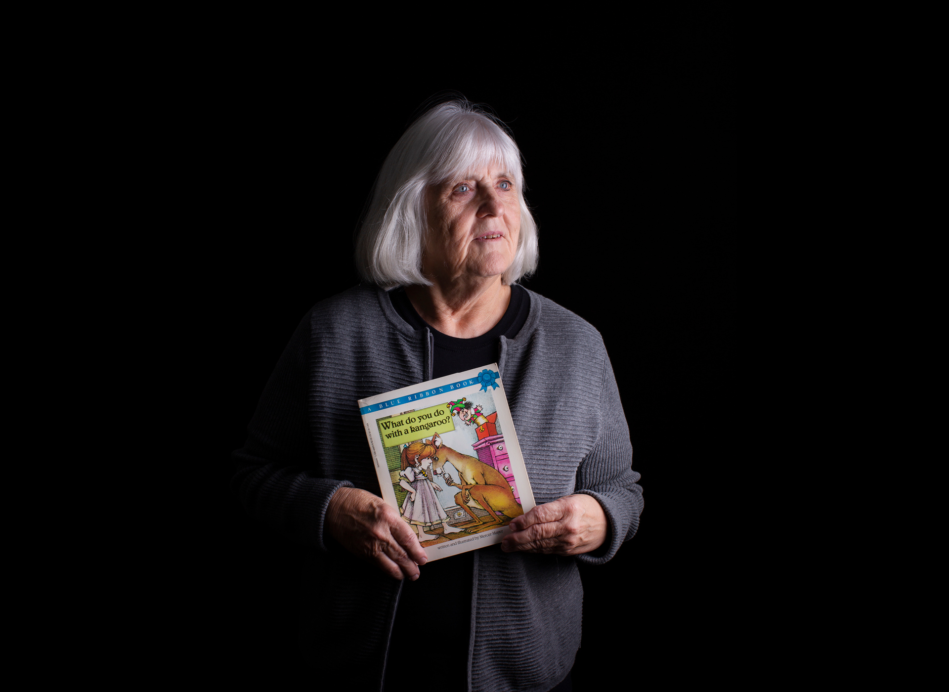 Ruth Parker holding book