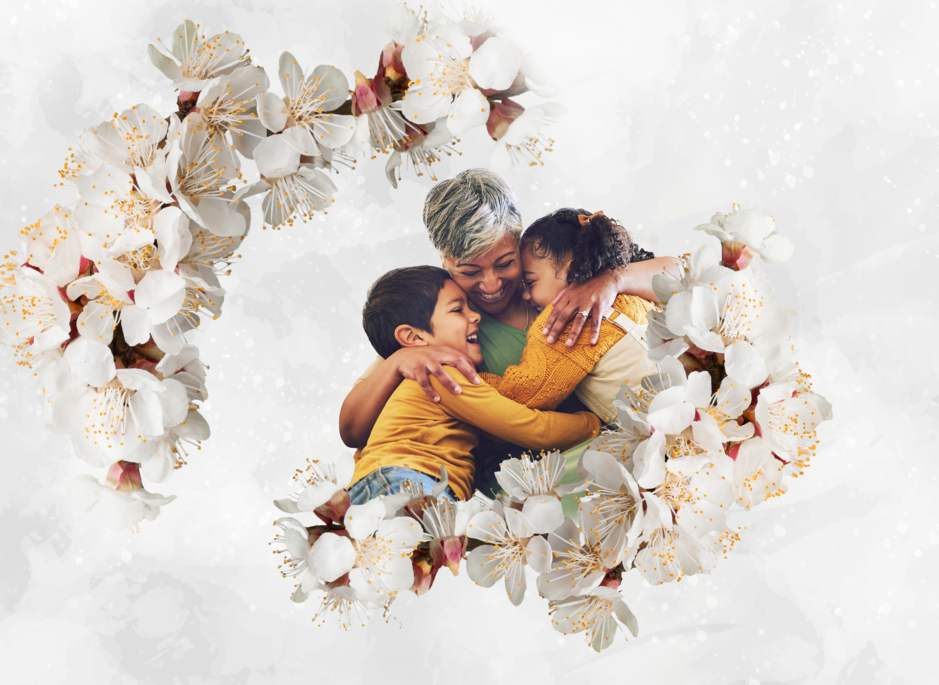 Mother hugging two children with flowers around them