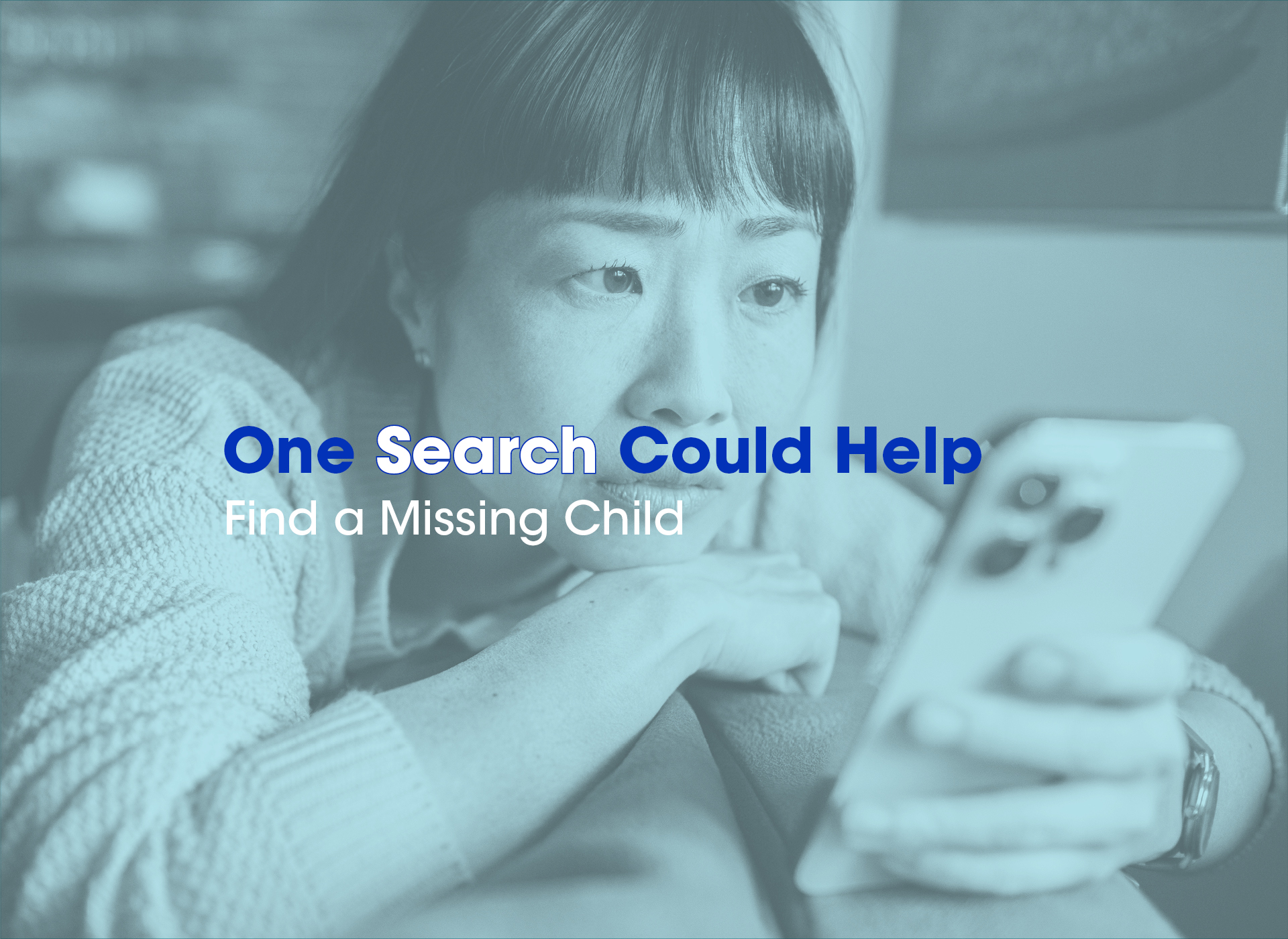 teen girl looking at phone; blue tone to picture