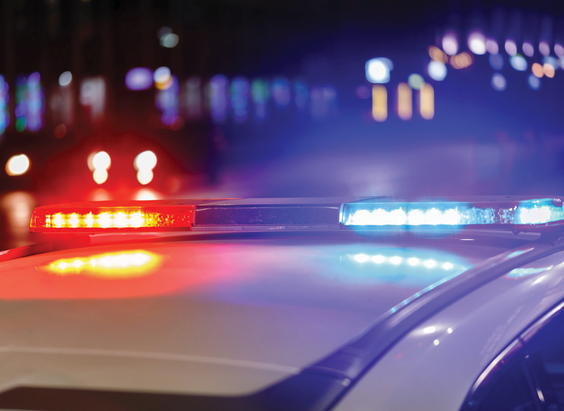 Police car driving on a street