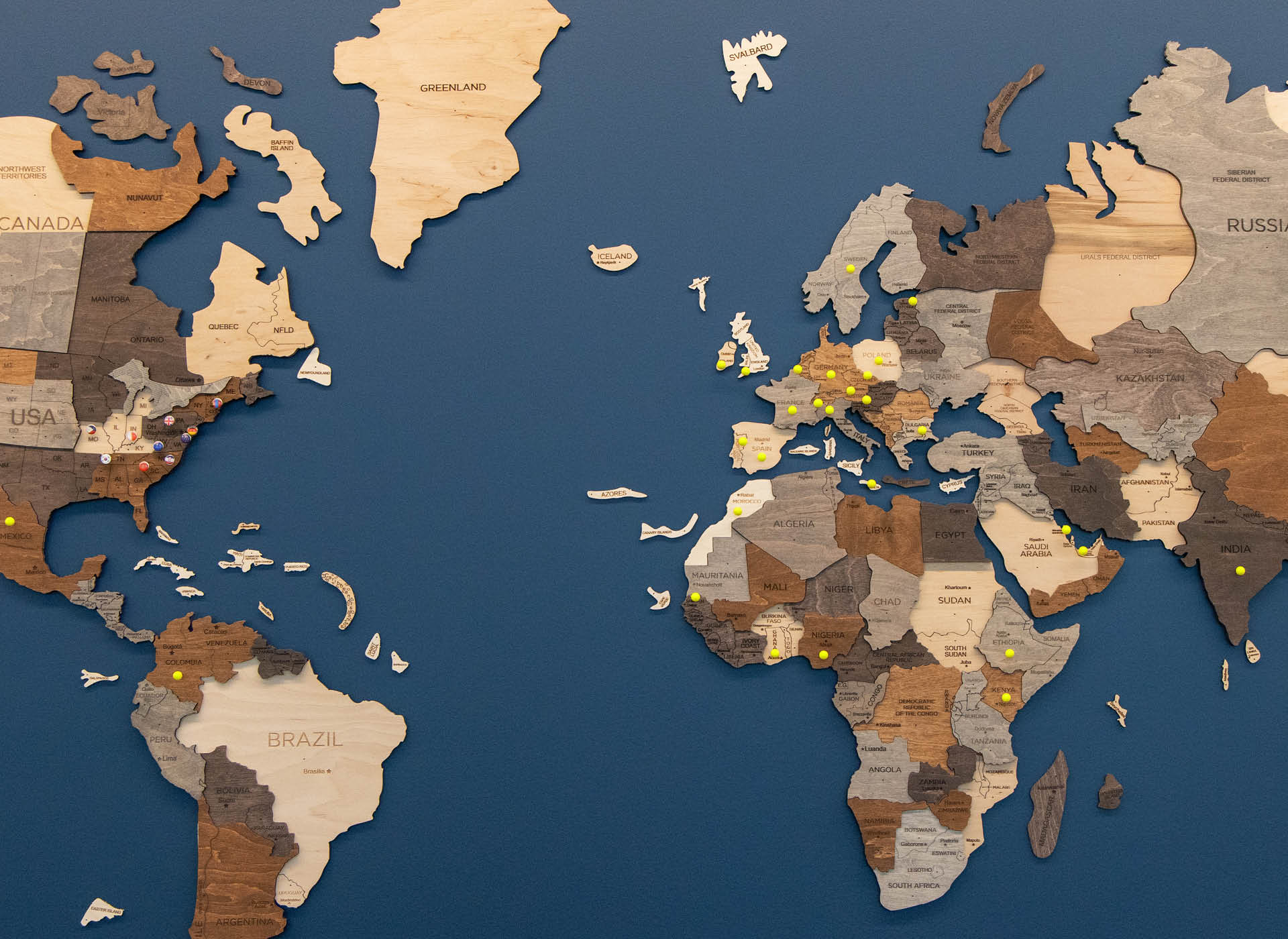 map of world in various shades of brown with blue oceans
