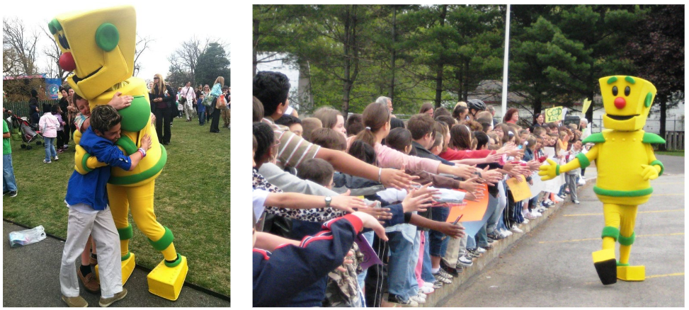 clicky gives kid hug (left); clicky gives line of kids a high five (right)